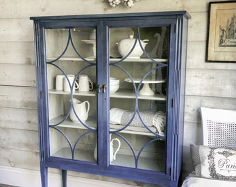 SOLD | Blue vintage painted China or Linen cabinet | blue painted glass-front storage cabinet | blue painted antique furniture cabinet