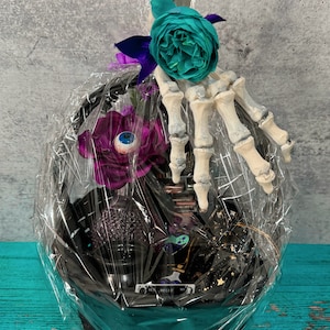 May include: A handcrafted wooden sign displaying the words "Welcome to our home" in a handwritten font. The sign is painted white with black lettering and a distressed finish, suitable for home decoration.