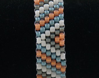 Pulsera peyote weave - Azul, Naranja, Blanco &Negro