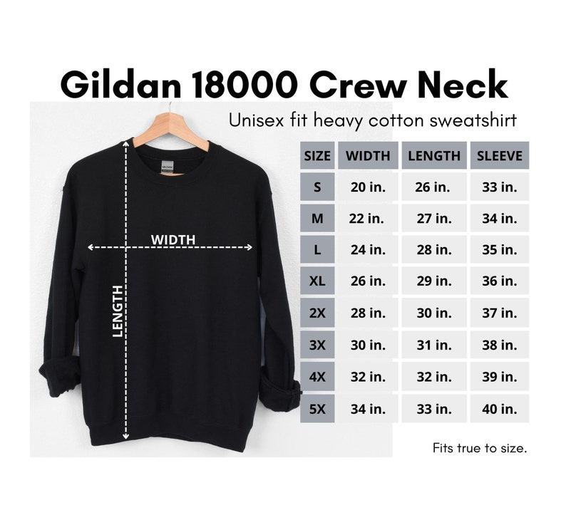 Puede incluir: Una sudadera de cuello redondo negra Gildan 18000 con una tabla de tallas que muestra las medidas en pulgadas para el ancho, la longitud y la longitud de la manga. La tabla incluye las tallas S, M, L, XL, 2X, 3X, 4X y 5X.
