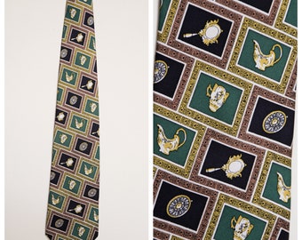 May include: A green, black, and gold patterned tie with a repeating design of teapots, mirrors, and circular motifs within frames.