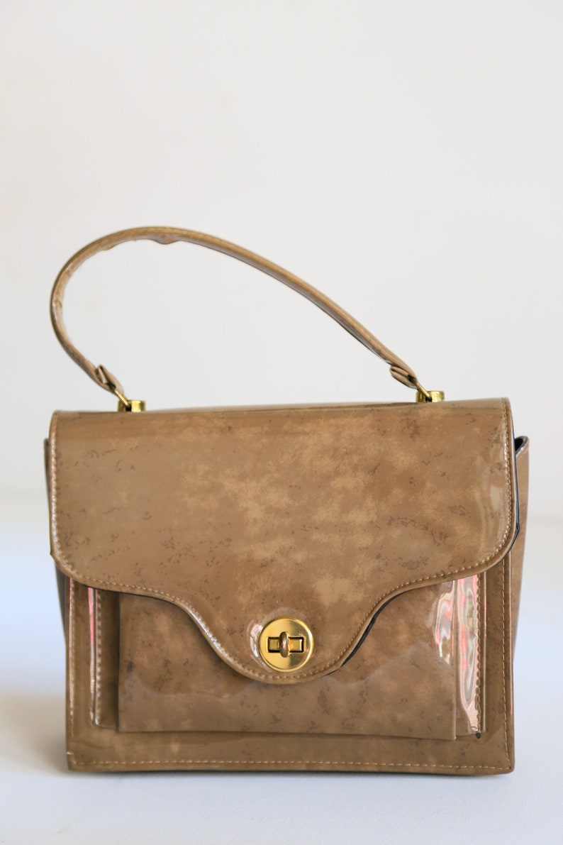 beige patent leather purse