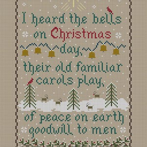 May include: Cross-stitch design featuring the text "I heard the bells on Christmas day, their old familiar carols play, of peace on earth goodwill to men." The design includes bells, birds, trees, and snowflakes, in a Christmas theme.