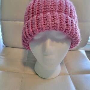 Hand knit pink beanie with grey removable faux fur pompom