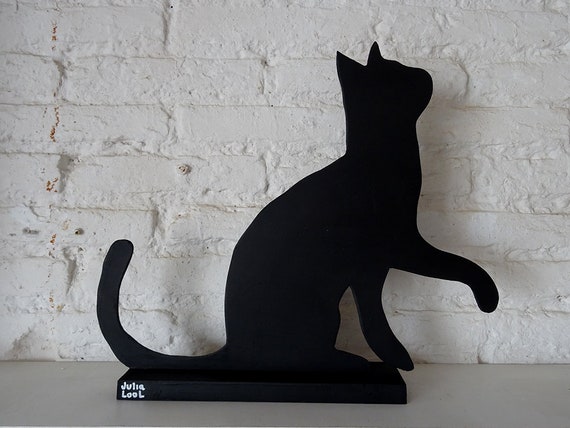 CAT PLAYING. Street art. Black cat by the Valencian artist Julia Lool made of DM wood.