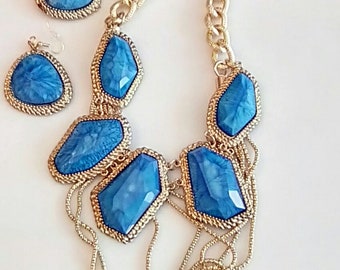 Gold Layered Chain Necklace. Think Gold Chain. Blue Turquoise Stones Necklace. Gold Trim Blue Turquoise Stone Earrings.  (SKU #UVF2PP720)