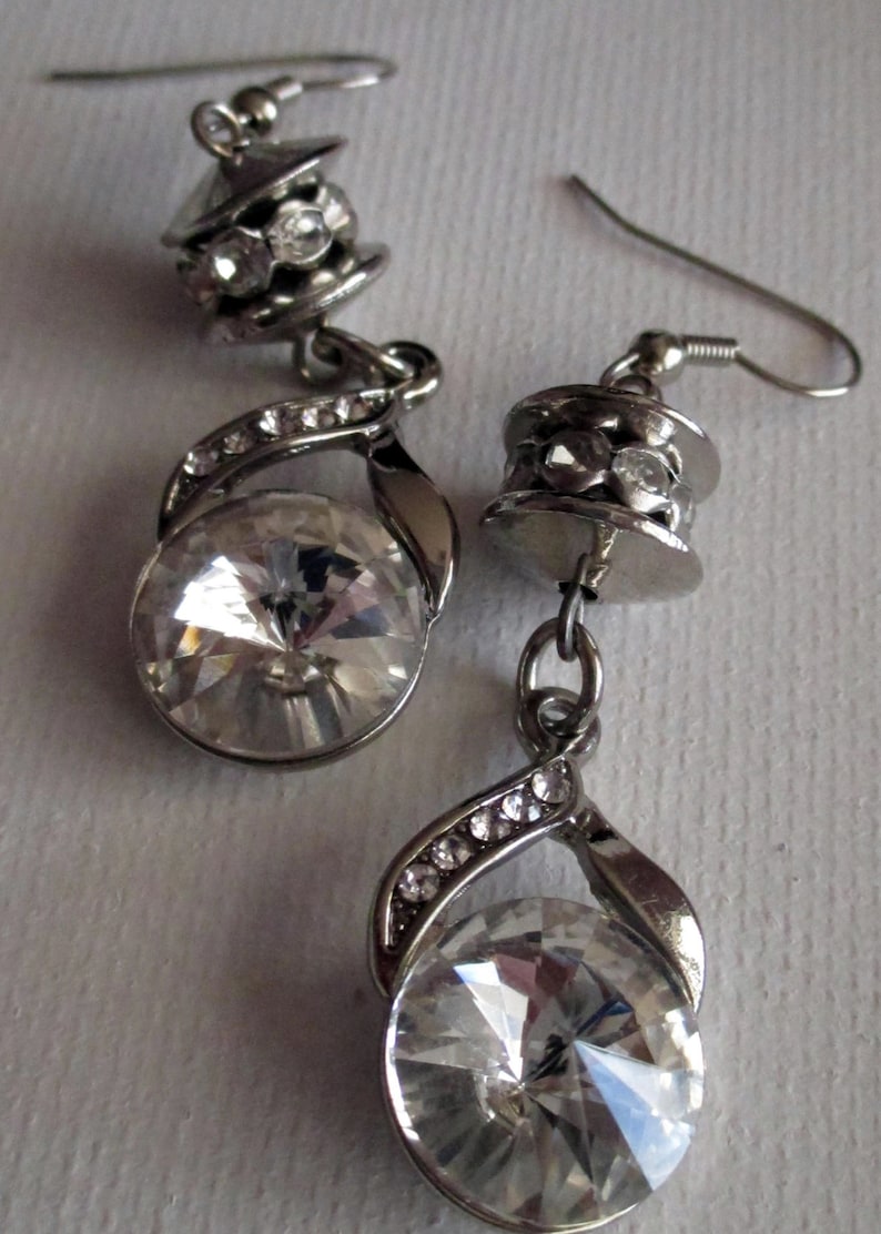 Silver and Crystal Necklace SKU #UVFP3P104 Pierced Earrings and bracelet
