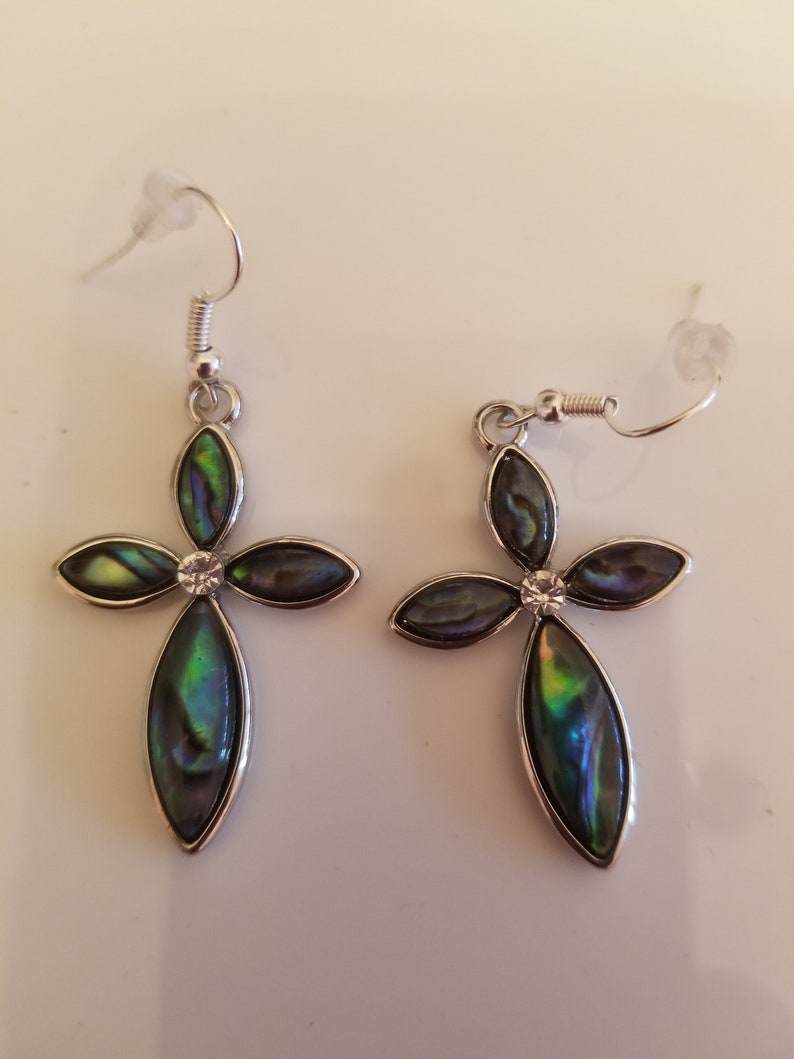Clear Oval Pendant Necklace with shades of green and gold accents and a pair of matching Cross Earrings SKU #UVF2PP125