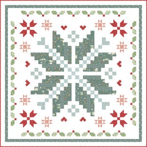 May include: A white quilt with a snowflake design in the center. The snowflake is made up of green and white squares. The quilt is surrounded by a border of red and green squares.