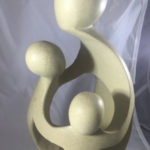 Family beige ceramic style candle holder sculpture for center table