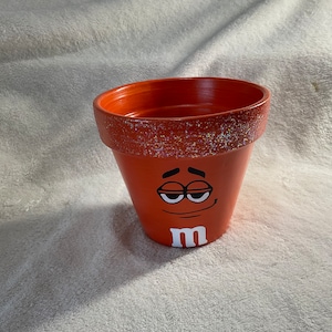 Orange M&M clay pot