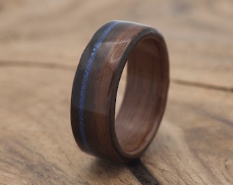 Ebbenhouten ring van gebogen hout met lapis-inleg