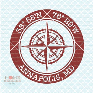 Puede incluir: Un diseño de brújula circular rojo con una rosa de los vientos blanca y el texto "ANNAPOLIS, MD" y "38° 58'N 76° 29'W".