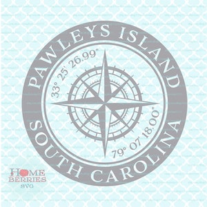 May include: A gray compass rose with a white background inside a circle with the text "Pawleys Island" and "South Carolina" around the compass rose. The coordinates "33° 25' 26.99" and "79° 07' 18.00" are also included in the circle.