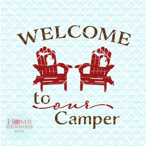 May include: Welcome to our Camper sign with two red Adirondack chairs with a fish silhouette on the back of each chair. The sign is brown with white text.
