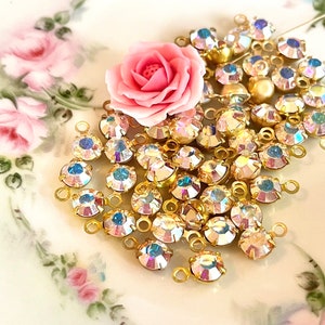 10 briljante Swarovski ab aurora borealis kristallen druppels in messing zetting 6,32 mm #brd29-23