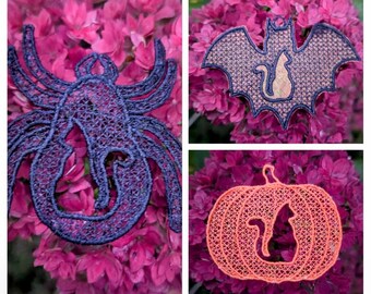 May include: Four Halloween-themed embroidered ornaments: a black spider, a brown bat with a black cat inside, a pumpkin with a black cat inside, and a pink flower.