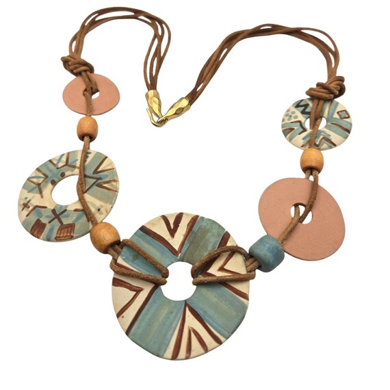 Handcrafted Vintage Ceramic & Leather Necklace With Earthy Tones And Tribal-Inspired Patterns Featuring Large Circular Pendants And Wooden B
