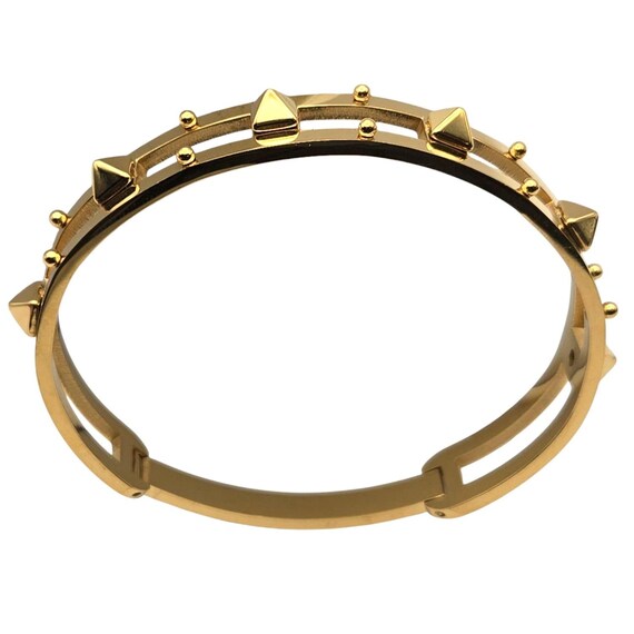Gold-Tone Pyramid Studded Bangle Bracelet With Cutout Design