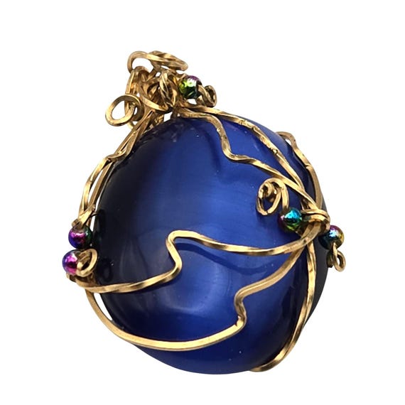 Handcrafted Blue Glass Pendant Wrapped In Elegant Gold-Tone Wire With Iridescent Bead Accents