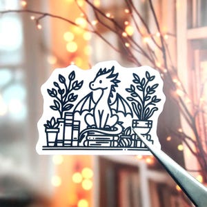 Cute Bookish Dragon Sticker | Fantasy Dragon on Books and Plants | Black and White Vinyl Sticker for Planners, Laptops, Water Bottles, Gifts