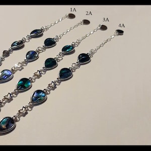 Teardrop Shaped Abalone Bracelet(s) with Silver Accents and Adjustable Chain