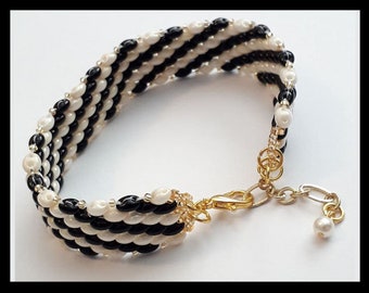Bracciale Preciosa Super Duo nero e crema con accenti in oro e perle Swarovski - Ottimo regalo di gioielleria!