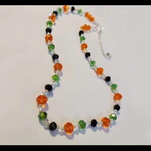 Black, Green. Orange, and Clear Halloween Themed Crystal Necklace with Silver Accents
