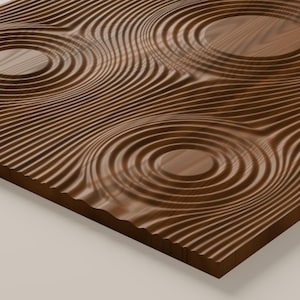 May include: A rectangular wooden panel featuring a carved surface with a series of concentric circular patterns that resemble ripples in water. The dark brown wood grain is visible throughout the textured, undulating surface design.