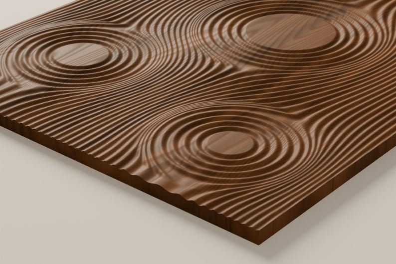 May include: A rectangular wooden panel featuring a carved surface with a series of concentric circular patterns that resemble ripples in water. The dark brown wood grain is visible throughout the textured, undulating surface design.
