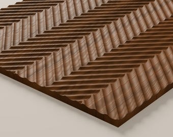 May include: A rectangular wooden board featuring a carved surface with a repeating chevron pattern. The dark brown wood displays visible natural grain lines running horizontally across the raised ridges and deep grooves of the texture.