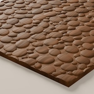May include: A rectangular wooden panel featuring a raised, three-dimensional surface texture composed of numerous smooth, rounded, pebble-like shapes of varying sizes. The wood displays a natural brown tone with visible grain patterns.