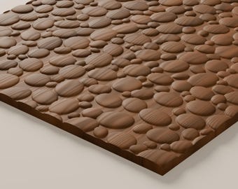May include: A rectangular wooden panel featuring a raised, three-dimensional surface texture composed of numerous smooth, rounded, pebble-like shapes of varying sizes. The wood displays a natural brown tone with visible grain patterns.