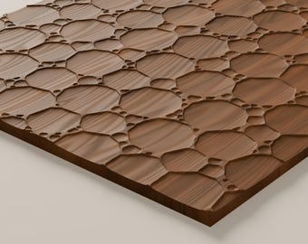 May include: A rectangular wooden panel featuring a carved surface pattern of interconnected octagonal shapes and smaller circular indentations. The wood displays a natural brown grain with varying tones and a smooth, recessed texture.