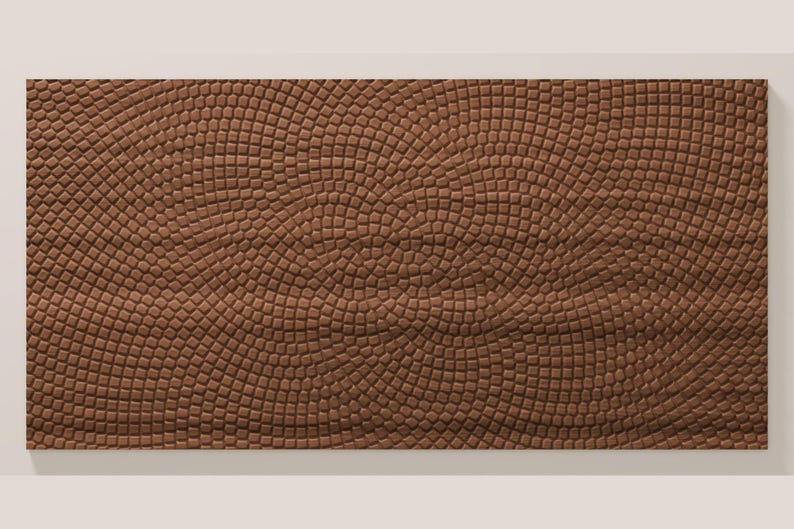 Puede incluir: Un panel de pared rectangular que presenta un patr&oacute;n repetitivo de peque&ntilde;as baldosas cuadradas de color marr&oacute;n dispuestas en una formaci&oacute;n curva similar a un mosaico. La superficie tiene una apariencia texturizada y tridimensional.