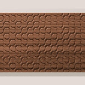 May include: A rectangular wooden panel featuring a repeating carved pattern of interconnected circles and flowing, curved lines. The surface displays a natural brown wood grain texture with deep, recessed grooves creating a three-dimensional effect.