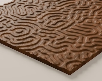 May include: A rectangular wooden panel featuring a carved, raised relief pattern of interconnected, flowing, maze-like lines. The natural brown wood grain is visible across the surface, creating a textured, three-dimensional effect.