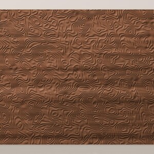 May include: A rectangular wooden panel featuring a carved, three-dimensional surface pattern of continuous, flowing, concentric lines that resemble topographic map contours, finished in a warm, medium-brown wood grain texture.