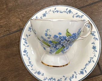 Vintage Queen Anne musical cup and plate China, made in England, cup and saucer china set. Beautiful design with golden edge/saucer matching