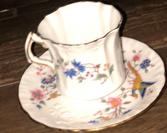 Vintage cup and plate china set. Beautiful design with golden edge, made in England