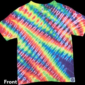 May include: A tie-dye t-shirt with a diagonal pattern in shades of red, orange, yellow, green, blue, and purple.