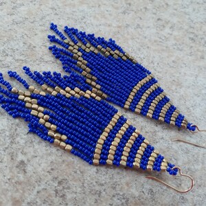 Long blue and gold beaded tassel earrings