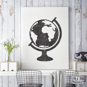 May include: Black and white illustration of a globe on a stand. The globe is a simple silhouette with a textured look. The image is on a white background.
