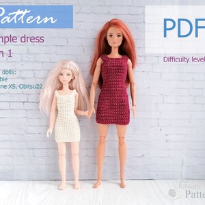 May include: A crochet pattern for a simple dress that can be made for two different doll sizes. The pattern is available as a PDF download and is easy to follow. The dress is shown in two colors, a white dress on a doll with blonde hair and a pink dress on a doll with red hair.