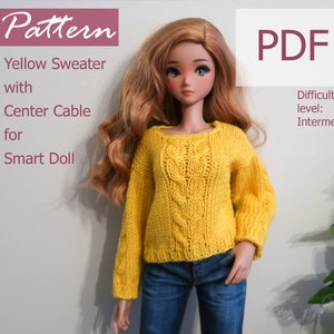 May include: A PDF pattern for a yellow sweater with a centre cable knit design, suitable for a Smart Doll. The difficulty level is listed as intermediate.