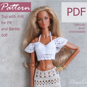 May include: A crochet top pattern for FR and Barbie dolls. The pattern is for an off-the-shoulder top with frills. The difficulty level is intermediate. The pattern is available as a PDF download. "KiNata Dolls" is printed in the bottom right corner of the image.
