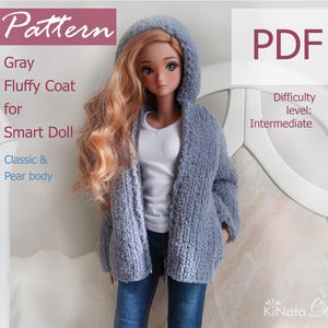 May include: A doll wearing a gray, fluffy hooded coat. The coat is designed for a Smart Doll and is labeled as an intermediate-level pattern. The image includes the text "Pattern" and "PDF".