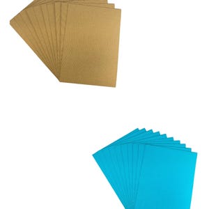 May include: A stack of 12 sheets of brown corrugated cardboard and a stack of 12 sheets of blue corrugated cardboard.