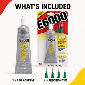 Puede incluir: Adhesivo E6000 Jewelry & Bead en un tubo plateado de 29,5 ml, acompa&ntilde;ado de un bl&iacute;ster que contiene un tubo id&eacute;ntico y cuatro puntas de precisi&oacute;n verdes. El empaque muestra el texto E6000, Jewelry & Bead y 1.0 fl oz (29.5 mL).