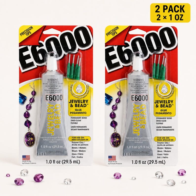 Puede incluir: Dos paquetes de pegamento E6000 Jewelry & Bead, cada uno con un tubo de 29,5 ml y puntas de precisi&oacute;n. El empaque tiene detalles en rojo y amarillo, texto sobre su uso en arcilla polim&eacute;rica, metales, madera y vidrio, y un collar de cuentas.